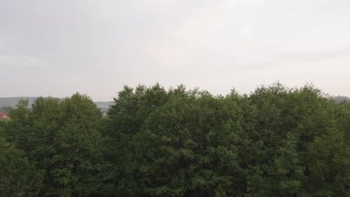 Gray clouds moving over Kolbudy village in pomeranian district.