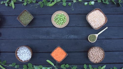 Legumes and Grains Displayed on Wooden Table