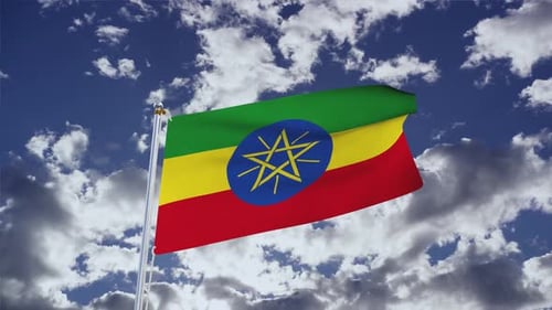 Waving Ethiopian Flag Against Blue Sky