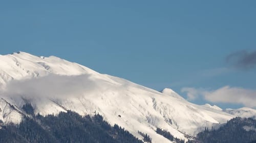 Zeitraffer Snow Mountain Peaks