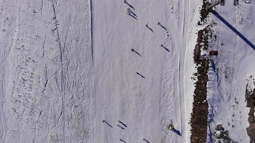 Aerial View of Skiers on Mountain Slope
