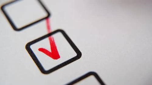 Check the Box in the Checklist with a Red Marker