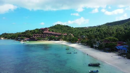 Beautiful bay with calm lagoon washing white sandy beach near vacations resort with sea view on trop