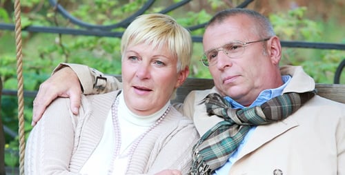 Loving Couple Together on Outdoor Swing