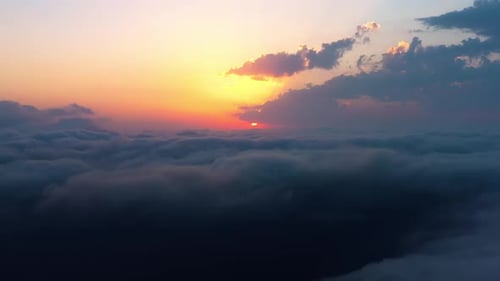 Aerial View of Clouds During Vibrant Sunset