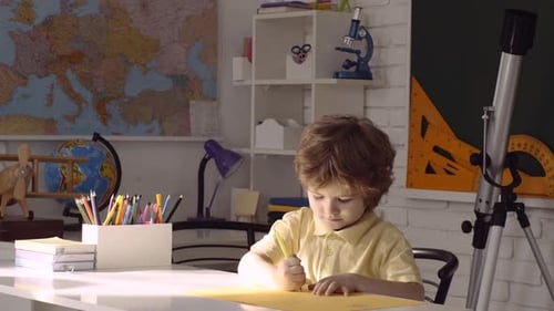 Kids Gets Ready for School. Child Near Chalkboard in School Classroom. Educational Process