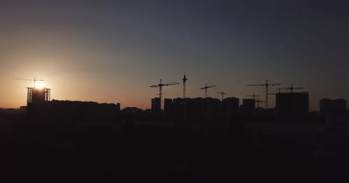 City Skyline Silhouette during a Colorful Sunrise