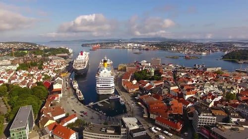 Cruise ships are moored in a harbor of Stavanger in summer, aerial view