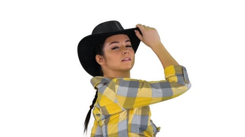 Woman Posing in Cowboy Hat and Plaid Shirt