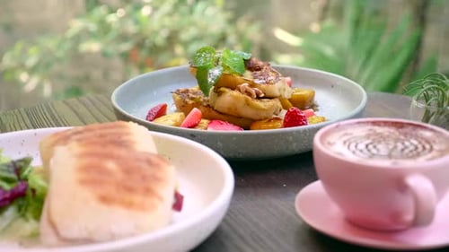 Lunch in Cafe Sandwich with Green Salad French Toasted Bread and Cup of Latte