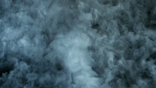 Abstract White Smoke Swirling on Black Background
