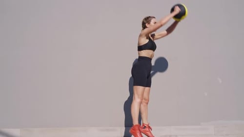 Cinematic action footage of a sport woman training