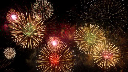 Brilliant Fireworks Exploding in Dark Night Sky