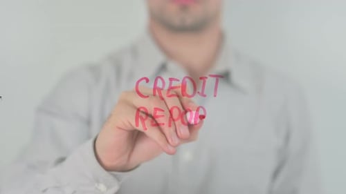 Writing Credit Report on Transparent Surface
