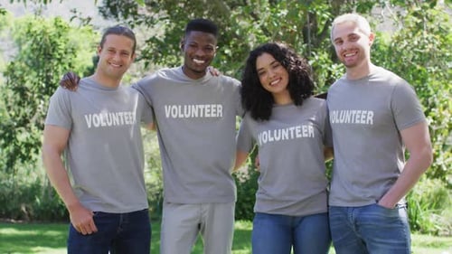 Group of Volunteers Standing Together Outdoors