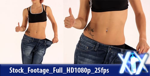 Slender Woman in Loose Jeans Demonstrates Weight Loss