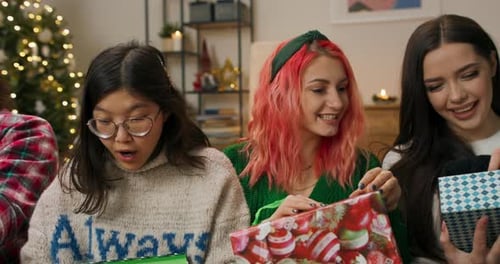 During the Christmas Party Friends Sat on the Couch in the Living Room and It Was Time to Receive