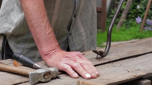 Old Man Takes Out the Nails.