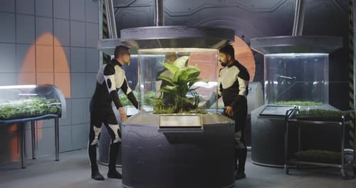 Astrobiologists Examining Plant Incubator
