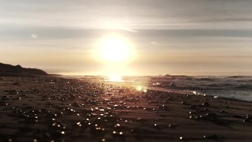Sunset Over Pebbles On Beach