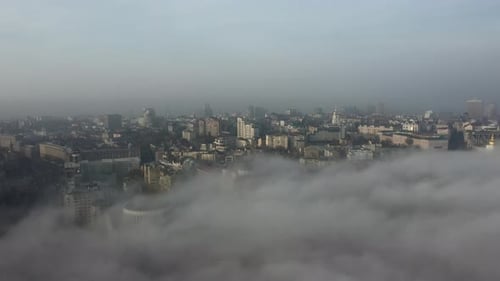Aerial View of the City in the Fog