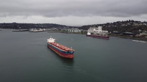 Distant Aerial Rotation Around an Oil Tanker Near a Port