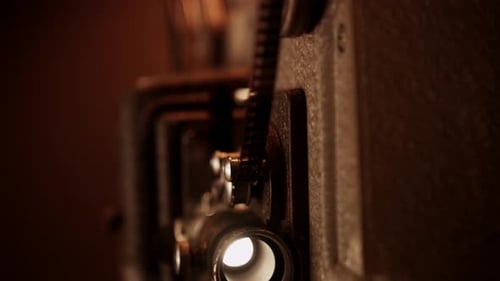 Film Projector Showing Light Through the Lens