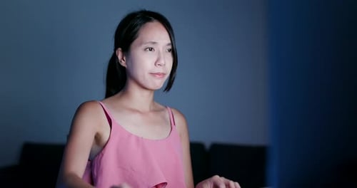 Tired Woman Rubbing Eyes in Front of Computer