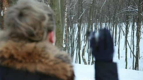 Pair Having Snowball Fight