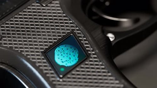 Handgun triggered with a fingerprint. Hi-tech smart gun lock. Fingerprint sensor