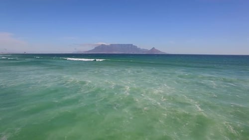 Aerial travel drone view of Table Mountain, Table Bay from Bloubergstrand, Cape Town, South Africa.