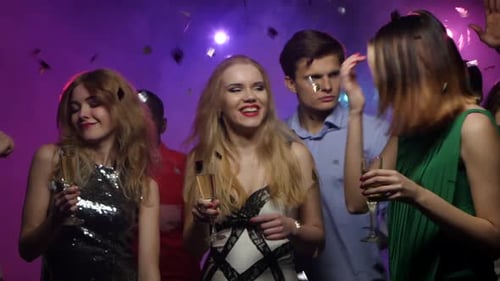 Excited Friends Celebrate at Nightclub Birthday Party