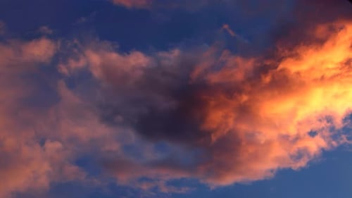 Stunning Bright Orange Huge Clouds at Sunset