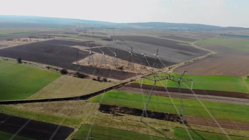 Aerial View of Agricultural Fields with Power Lines