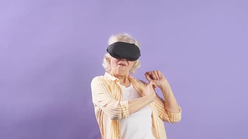 Senior Woman Using Virtual Reality Headset
