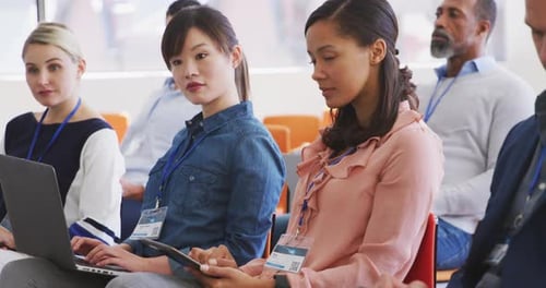 Business people attending to a meeting in conference room