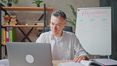 Teacher Explains Lesson During Online Video Call