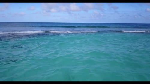 Aerial above abstract of relaxing coastline beach journey by blue sea with bright sandy background o