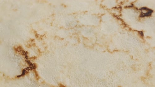 Ready to be filled and rolled tasty dessert surface 4K 2160p 30fps UltraHD footage - Close-up textur