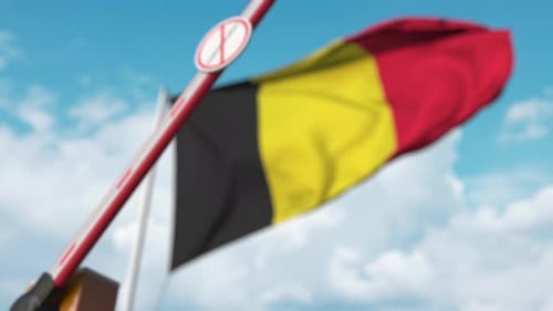 Belgium Flag Waving with Closing Border and Coronavirus Sign