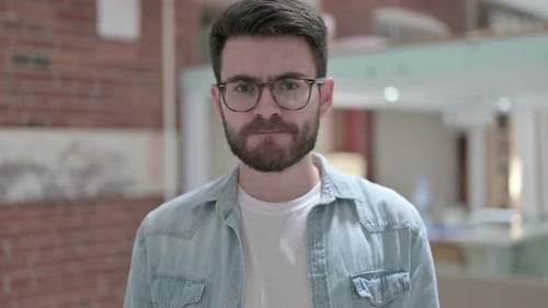 Man Nodding Indoors