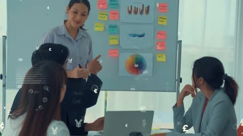 Business People in Corporate Staff Meeting with Envisional Graphic