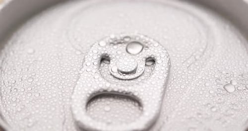 Refreshing Cold Soda Can with Condensation