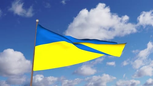 Waving Flag of Ukraine Against a Clear Blue Sky