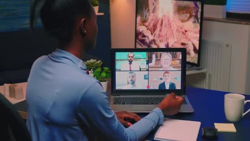 Woman Working From Home Having Video Conference