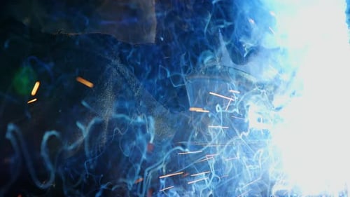 Welder welding a metal
