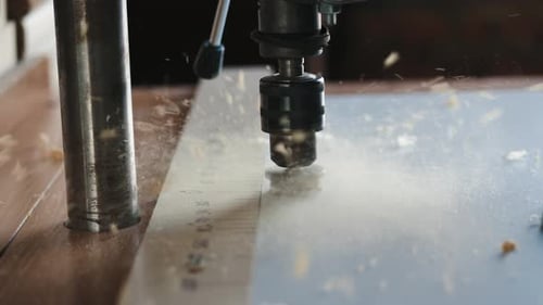 Drill Press Cutting Through Wood