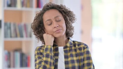 Portrait of Sleepy Mixed Race Woman Taking Nap