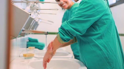 Surgeons Washing Hands Before Operation in Hospital
