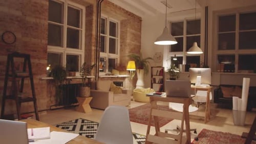 Interior of Contemporary Loft Office with Modern Workplaces